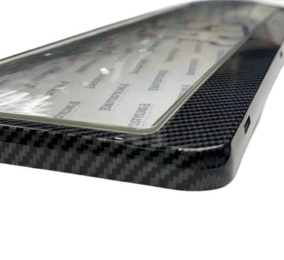 CARBON NUMBER PLATE HOLDER WITH DOMED PLASTIC COVERING